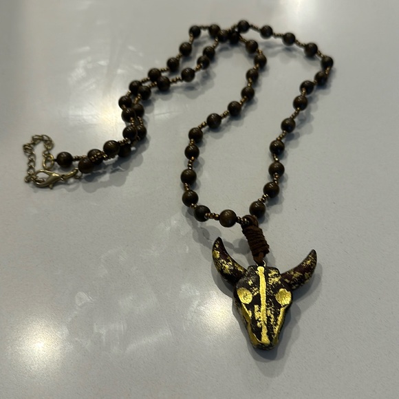 Steerhead wooden necklace with copper colored beds throughout - Picture 1 of 3